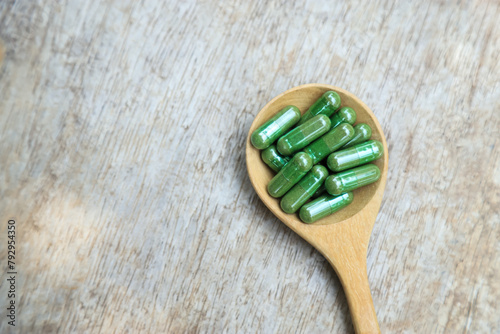 Green herbal capsules from herb for healthy eating in daily life