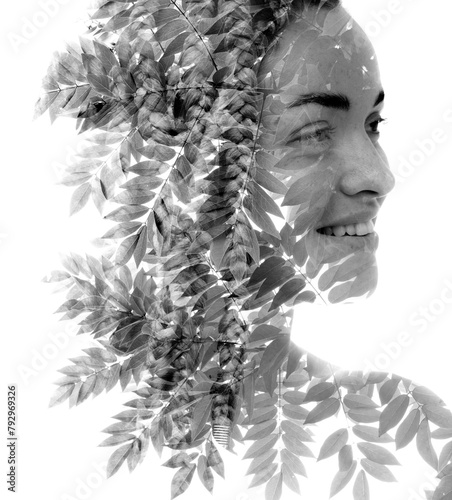 A disappearing black and white double exposure portrait of a smiling woman