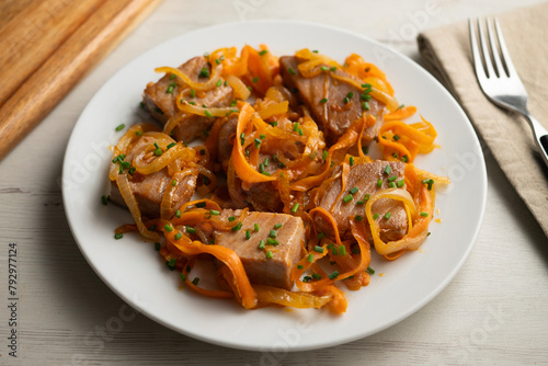 Fototapeta Naklejka Na Ścianę i Meble -  Atun encebollado. Traditional spanish tapa with premium tuna cooked with onions.