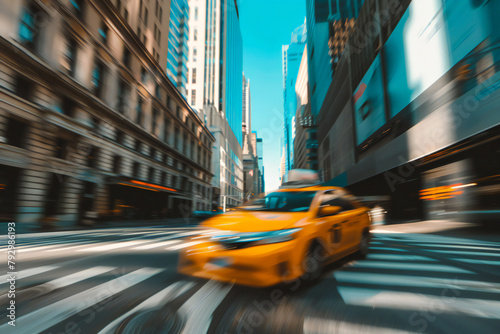 Fast city cab. A blurry yellow cab rushes through a city of skyscrapers. 