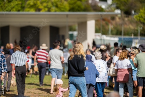 Weekend country market in a park in Australia. Family’s and people at a Farmers market selling fruit and vegetables in hobart