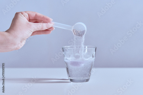 Dietary supplement in tablet and powder form taken with a glass of water