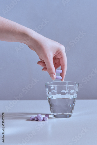 Dietary supplement in tablet and powder form taken with a glass of water