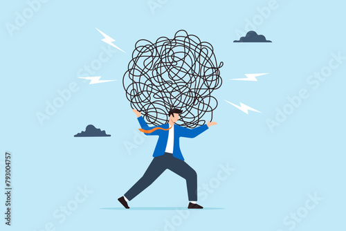 Tired businessman carries heavy tangled line on his back, illustrating burdens of stress. Concept of anxiety from work difficulty, overload, and challenges of navigating economic crises
