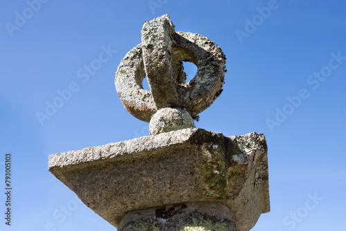 Decaying garden stone ornament photo