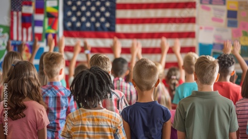 A group of students pledging allegiance to the American flag in a classroom.  photo