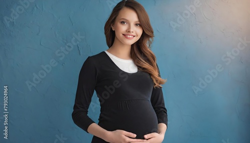  Beautiful pregnant woman standing on blue background