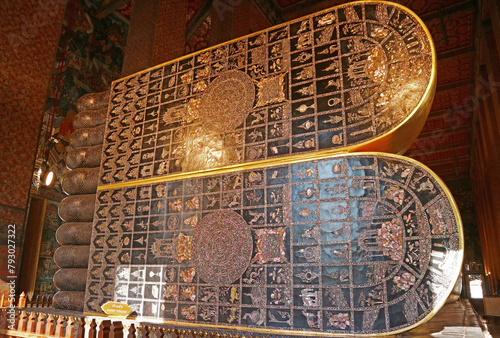 Soles of Reclining Buddha's Feet in Wat Pho Temple, Inlaid 108 Auspicious Symbols with Mother of Pearl, Bangkok, Thailand photo