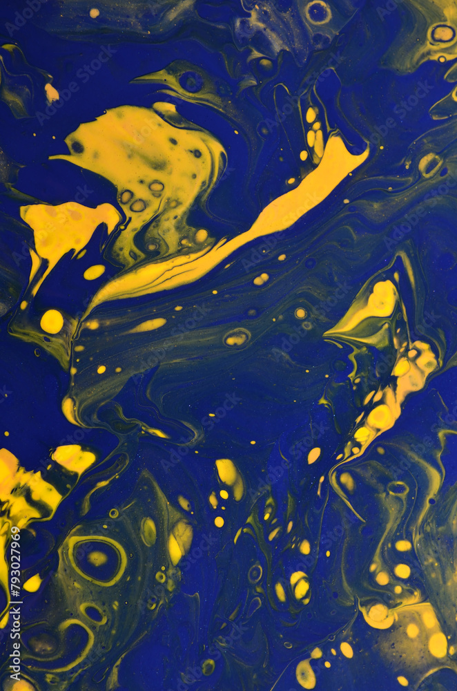 abstract art background in dark yellow and blue colors with cells and splashes