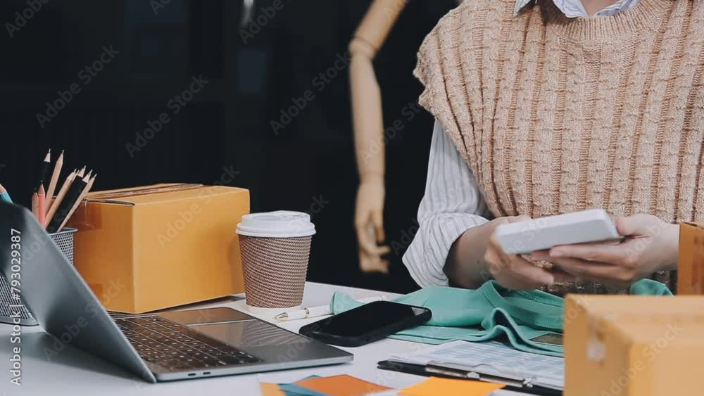 Business woman start up small business entrepreneur SME success .freelance woman working at home with Online Parcel delivery. SME and packaging deliveryconcept Business woman start up small business entrepreneur SME success .freelance woman working at home with Online Parcel delivery. SME and packaging deliveryconcept