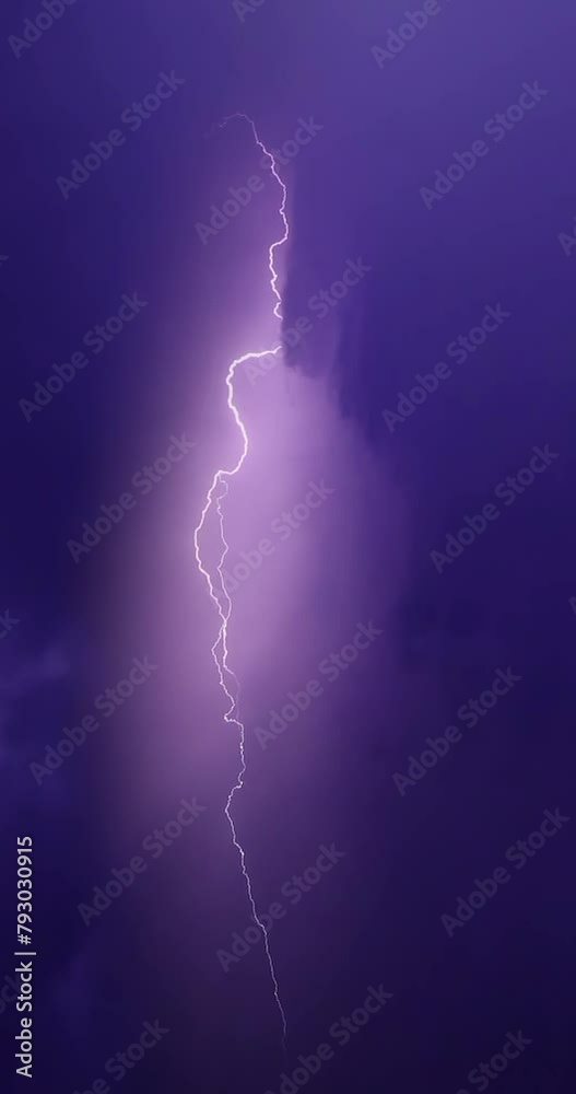Lightning storm in the night sky. Multiple lightnings and thunders illuminate night sky