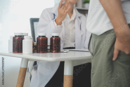Male hand holding her bottom because having abdominal pain and hemorrhoids, health care, constipation, Anatomical, suffering from pain, abdominal, bowel problem, bloody diarrhea, stomach ache, cancer