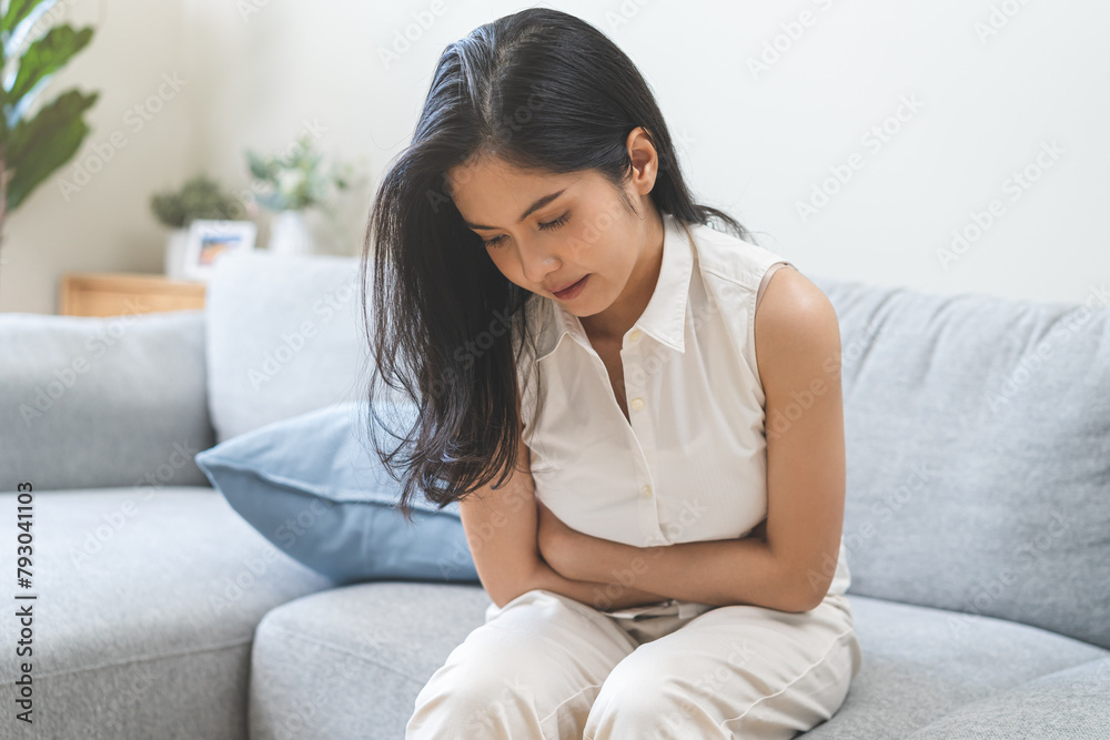 Flatulence ulcer, asian young woman, girl hands in belly, stomach pain from food poisoning, abdominal pain and digestive problem, gastritis or diarrhea. Abdomen inflammation, menstrual period people. Flatulence ulcer, asian young woman, girl hands in belly, stomach pain from food poisoning, abdominal pain and digestive problem, gastritis or diarrhea. Abdomen inflammation, menstrual period people.