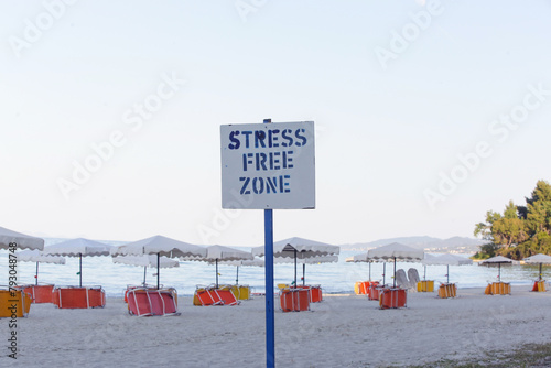 Stress free zone sign at the beach 