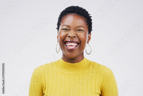 Studio, portrait and laugh for black woman, funny and confidence on white background. Face, joke and comedy for happy female student, cheerful and meme for humor and smile for silly or goofy comic