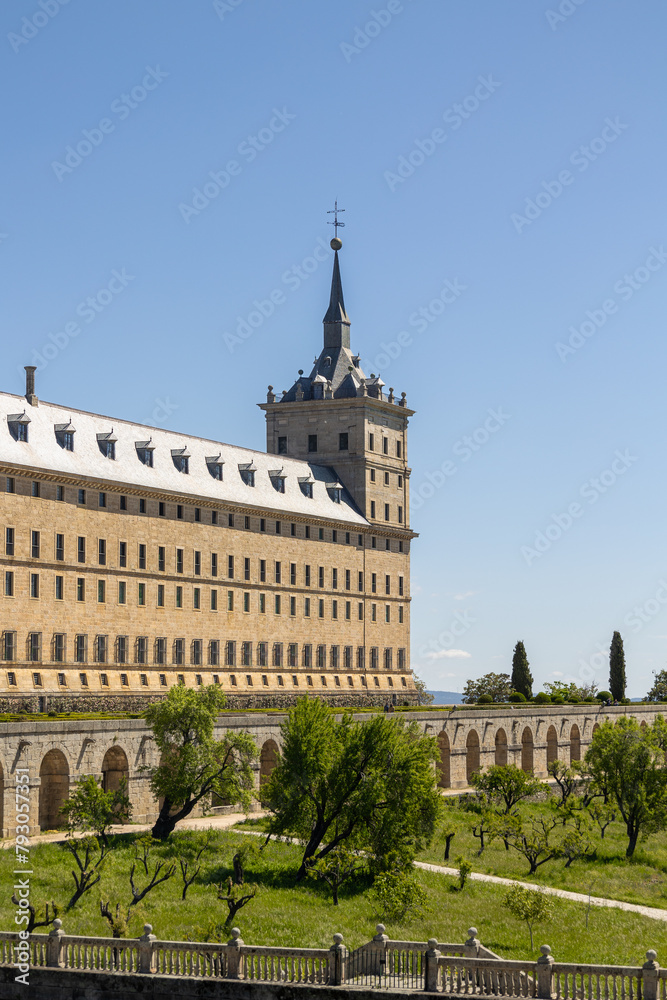 Real Monasterio de San Lorenzo de El Escorial historic building with gardens landscaped plants, Madrid, Spain
