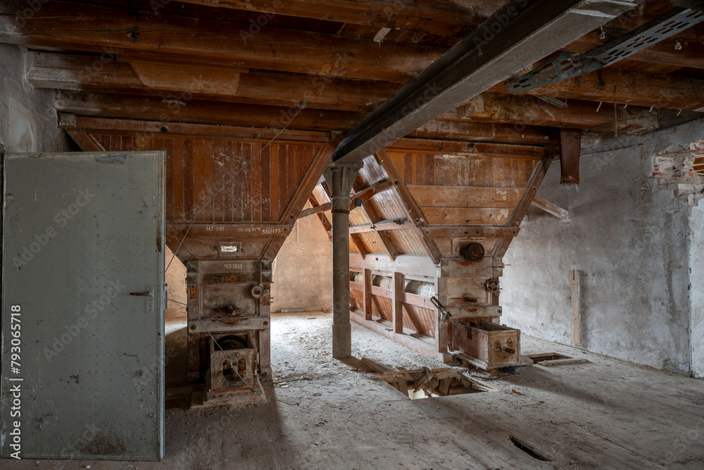 Exploration of the historic old stone mill with a spiral staircase in Southern Poland, Europe, in Winter