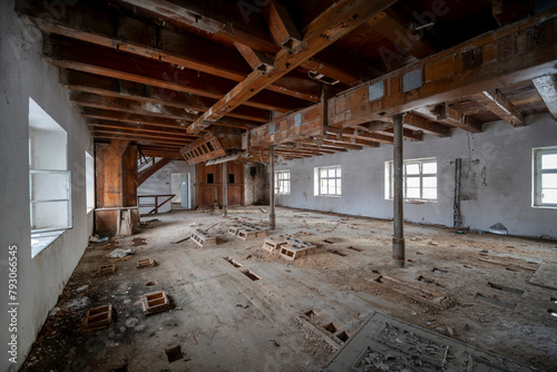 Exploration of the historic old stone mill with a spiral staircase in Southern Poland, Europe, in Winter