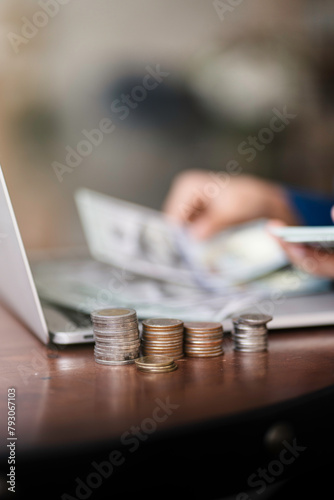 Happy smart Asian woman saving money. saving and money concept.