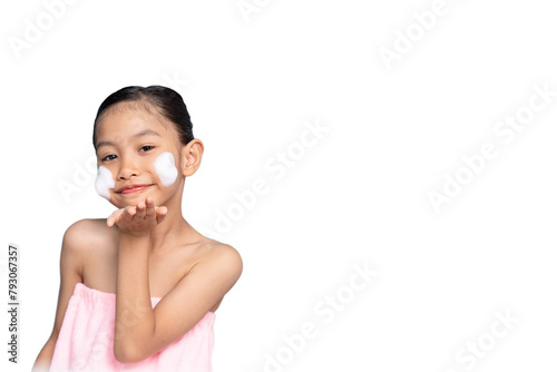 A woman is washing her face with facial cleansing foam.