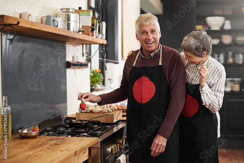 Cooking, portrait and senior couple in kitchen at home with ingredient for health diet meal. Laughing, food and elderly man and woman with funny joke for dinner, lunch or supper with vegetables.