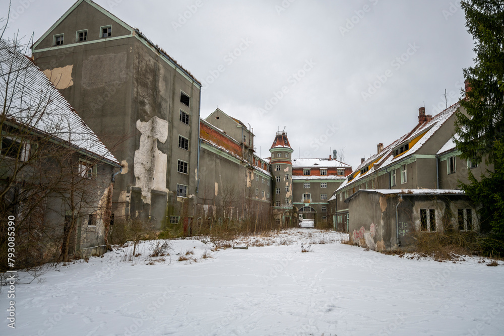 Exploration of the historic old stone mill with a spiral staircase in Southern Poland, Europe, in Winter