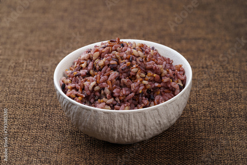 Mixed grains and mixed grain porridge on monochrome background