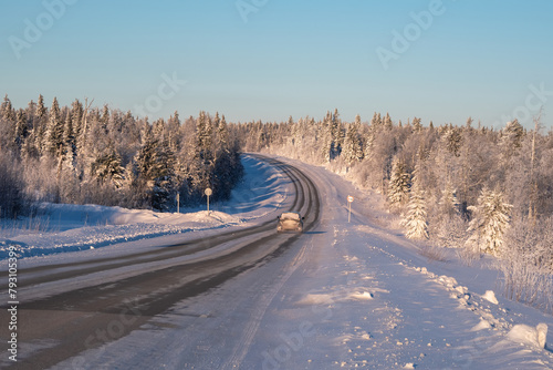 Frozen winter road. Winter landscape with a view of the road.