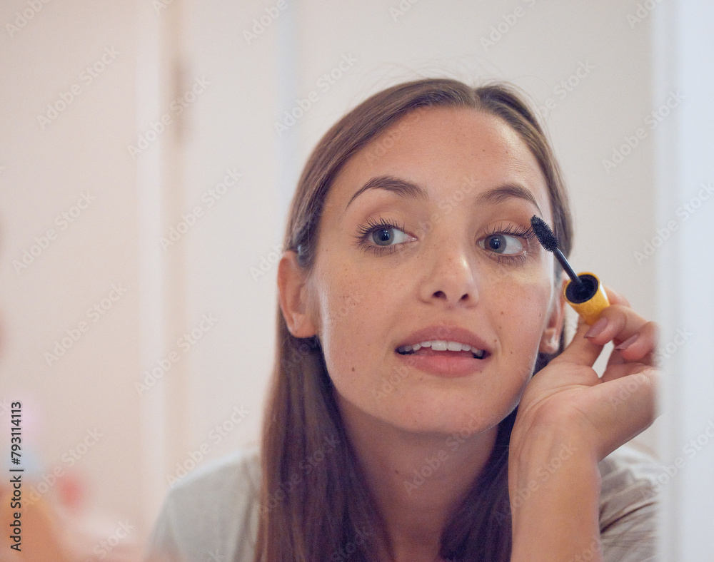 Face, makeup and woman with mascara brush in home for beauty, skin and treatment on morning routine in bathroom. Eyelash, cosmetics and girl apply product extension for health, glow and preparation Face, makeup and woman with mascara brush in home for beauty, skin and treatment on morning routine in bathroom. Eyelash, cosmetics and girl apply product extension for health, glow and preparation