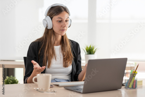 Remote work communication young woman participating in a virtual meeting