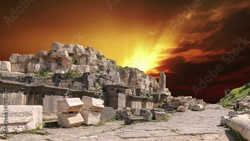 Roman ruins at Umm Qais (Umm Qays)--is a town in northern Jordan near the site of the ancient town of Gadara, Jordan. Against the background of the sunset, 4K, time lapse photo