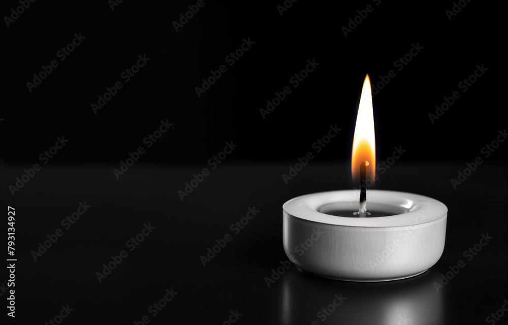 Single candle black background. Single candle black background.