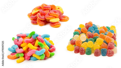 Assorted colorful gummy candies isolated on a white background.