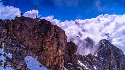 Dramatic skies and clouds over the summit ridge of The Zugspitze,2962 m above sea level,the highest peak in Germany, lying south of the town of Garmisch-Partenkirchen in Bavaria, Germany
