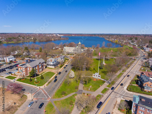 Wakefield historic town center aerial view on town common with Lake Quannapowitt at the back in Wakefield, Massachusetts MA, USA. 