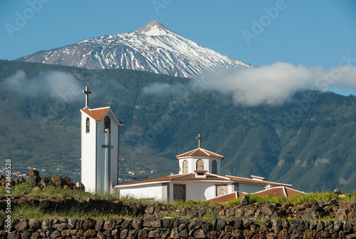 Iglesia Ntra. Señora de la Paz y vista del Teide nevado en el Puerto de la Cruz en Tenerife, islas Canarias photo
