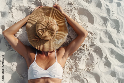 Woman in Bikini Laying on Beach
