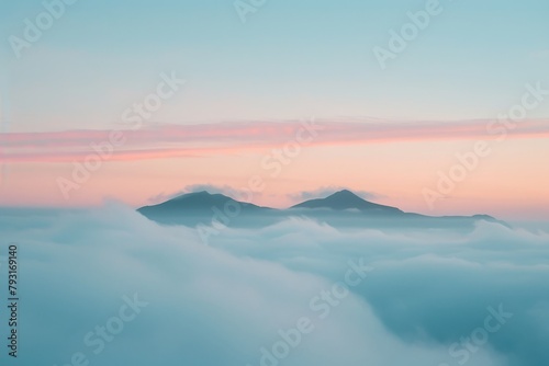  A pink-blue sky with clouds and distant mountains; mountains have pink-blue background
