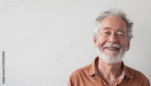 Construct an abstract art piece capturing the essence of a senior mans smile in a studio. Use innovative, non-human forms and a spectrum of calm, photo