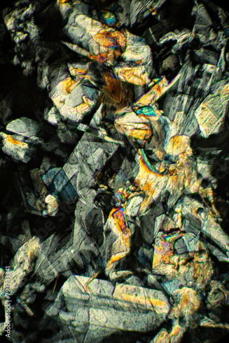 Abstract micrograph showing crystals of an amino acid, methionine.