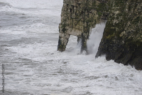 Waves crashing against the Bempton Cliffs in the East Riding of Yorkshire, UK