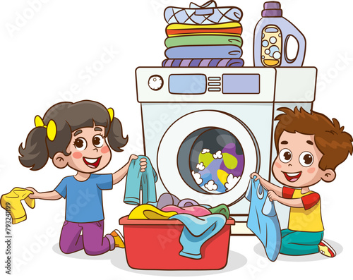 Happy little childrens doing daily chores with washing machine, holding a basket full of laundry.