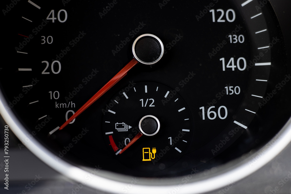 battery status indicator in a classic car that is powered by electricity, is discharged and will take a long time to charge
