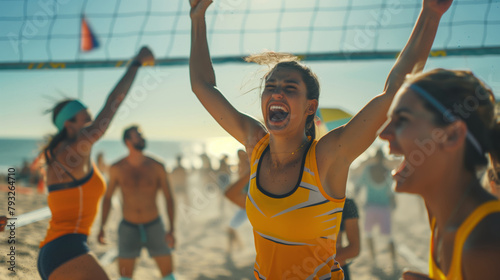 Siegesfreude: Beachvolleyball-Team feiert Erfolg photo