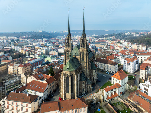 Brno, Czechia. Active Roman Catholic cathedral of. Originally medieval in gothic style, then many renovations, High towers added in Gothic revival between 1901-1909. Aerial view