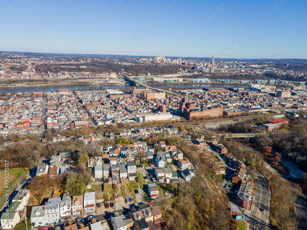 Aerial cityscape with river and fall foliage in residential Pittsburgh Pennsylvania