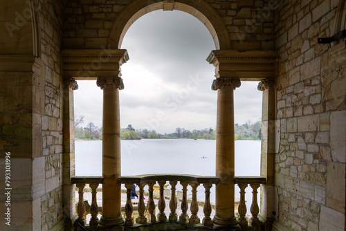 Hever Castle loggia on a cloudy spring afternoon, view over the lake, Hever, Kent, England photo