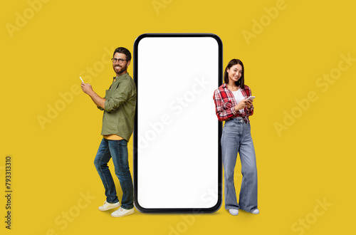 Two people showcasing gigantic phone display mockup