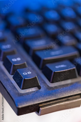 Detail of a non-backlit gaming keyboard.