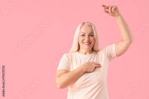 Mature woman checking her b...